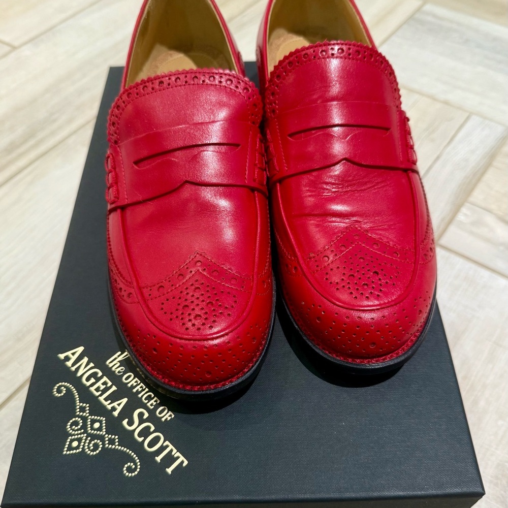 Vibrant Red Leather Flats with Classic Penny Loafer Design